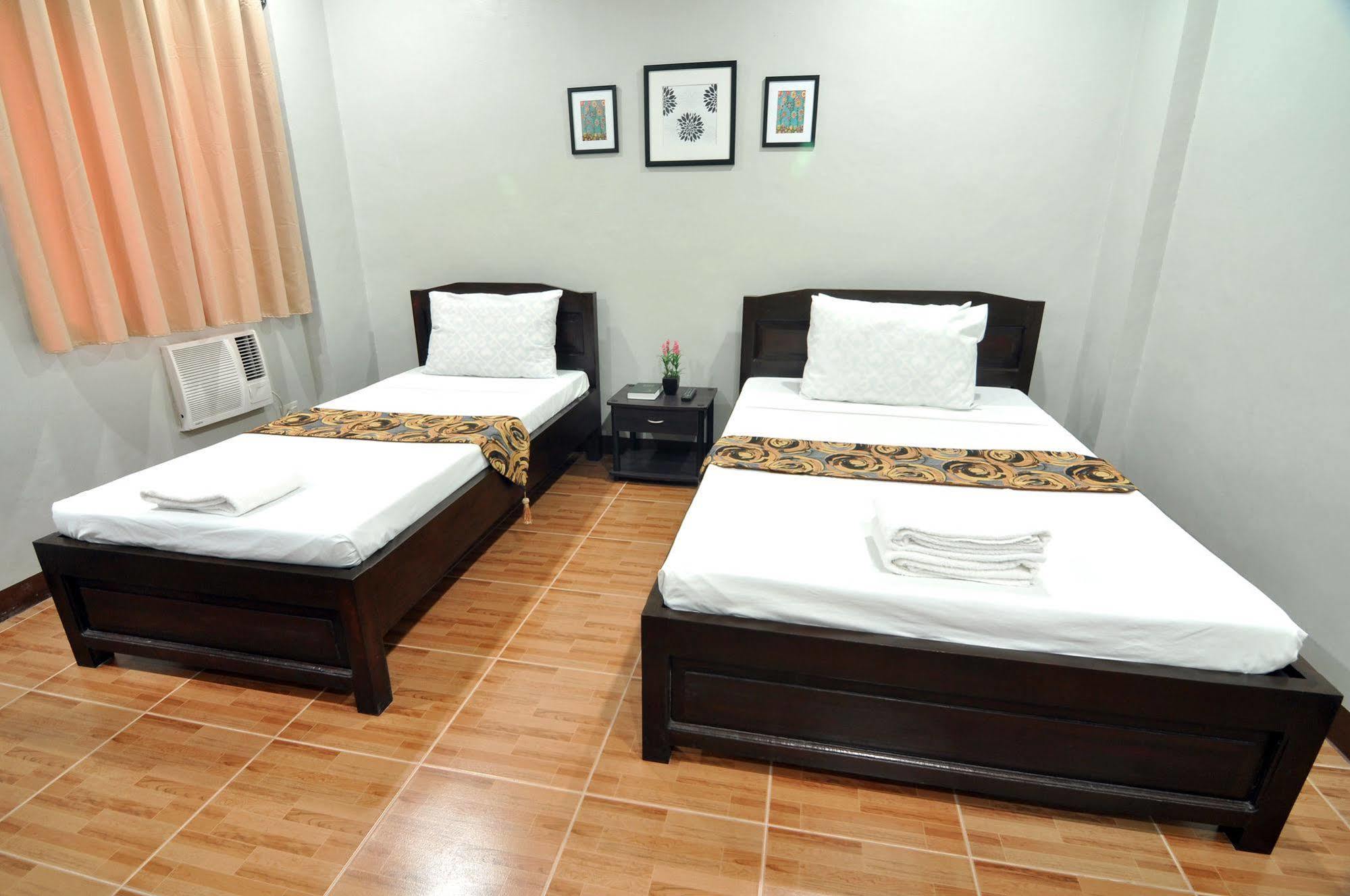Harbour Gardens Tourist Inn Тагбиларан Сити Екстериор снимка