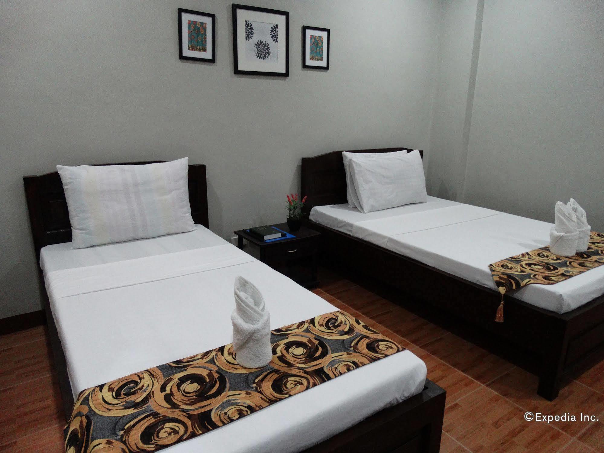 Harbour Gardens Tourist Inn Тагбиларан Сити Екстериор снимка