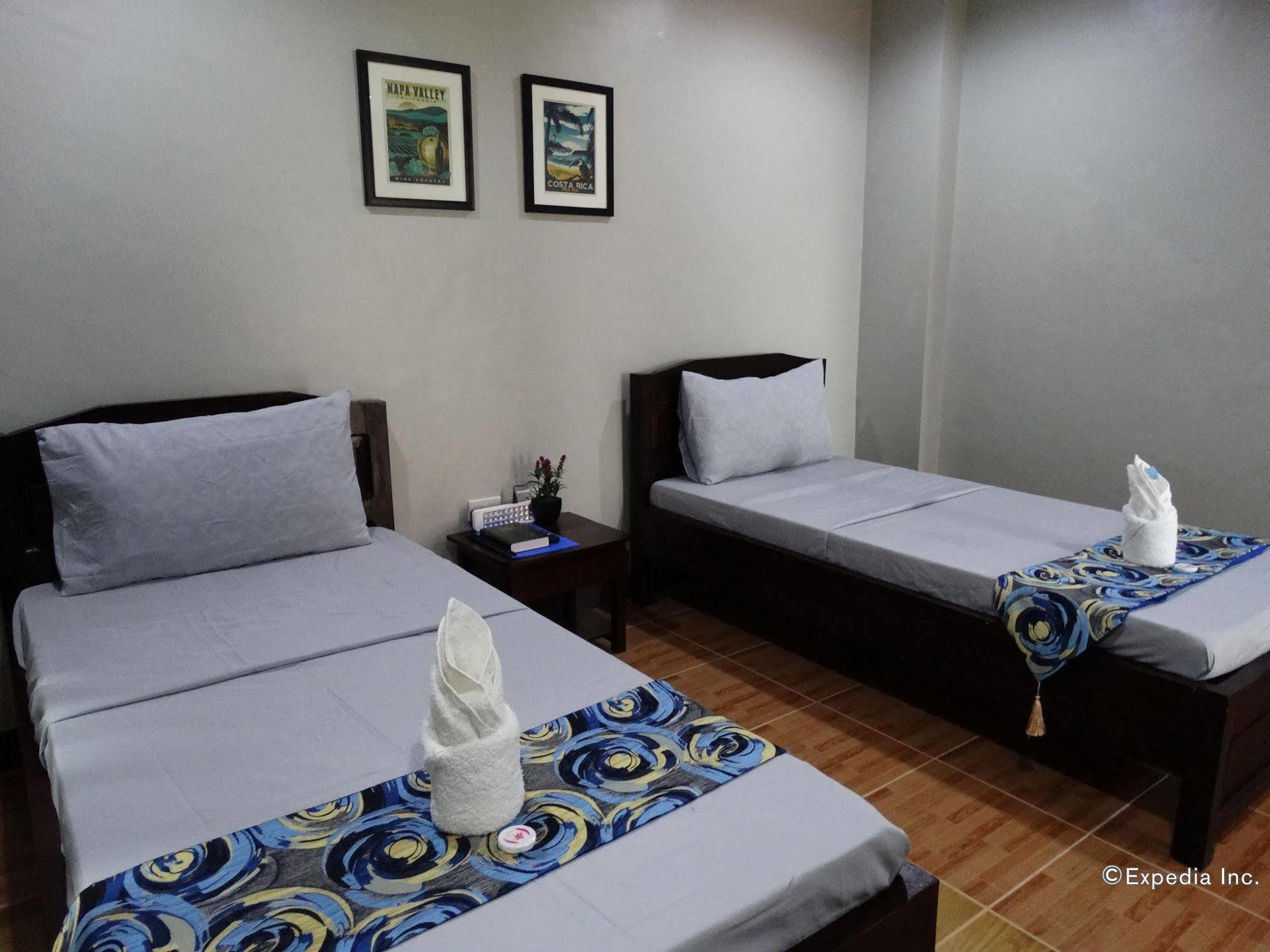Harbour Gardens Tourist Inn Тагбиларан Сити Екстериор снимка