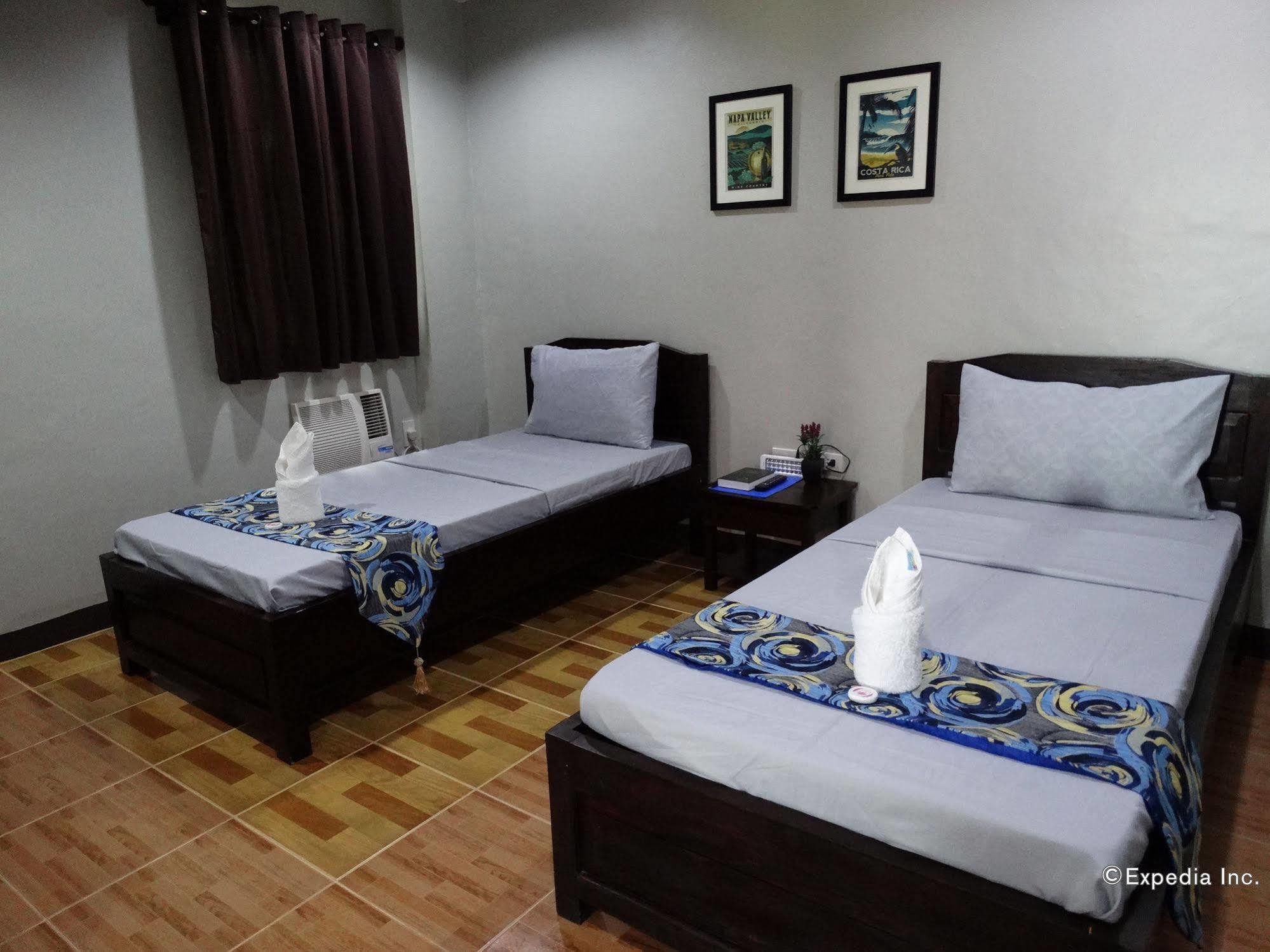 Harbour Gardens Tourist Inn Тагбиларан Сити Екстериор снимка