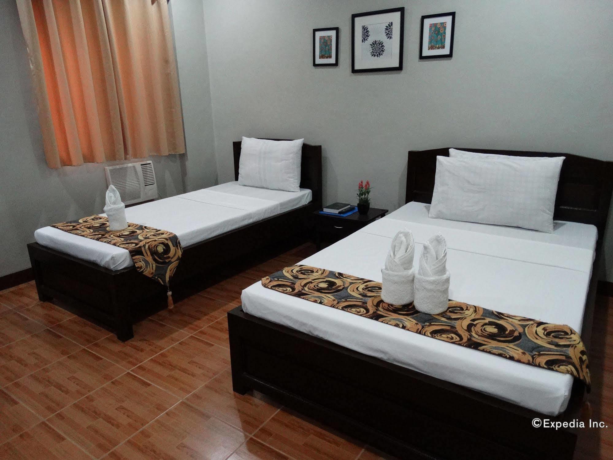 Harbour Gardens Tourist Inn Тагбиларан Сити Екстериор снимка
