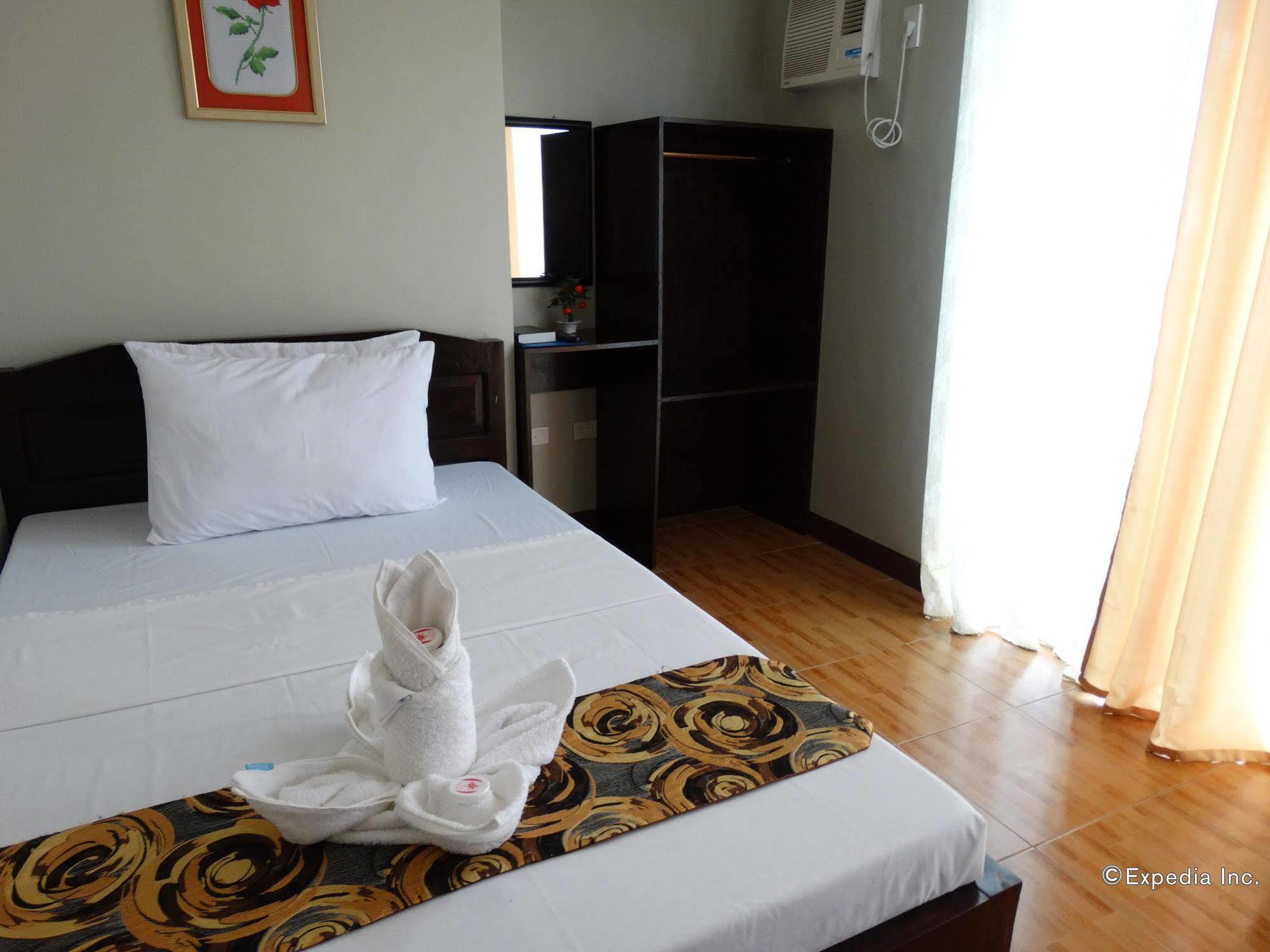 Harbour Gardens Tourist Inn Тагбиларан Сити Екстериор снимка